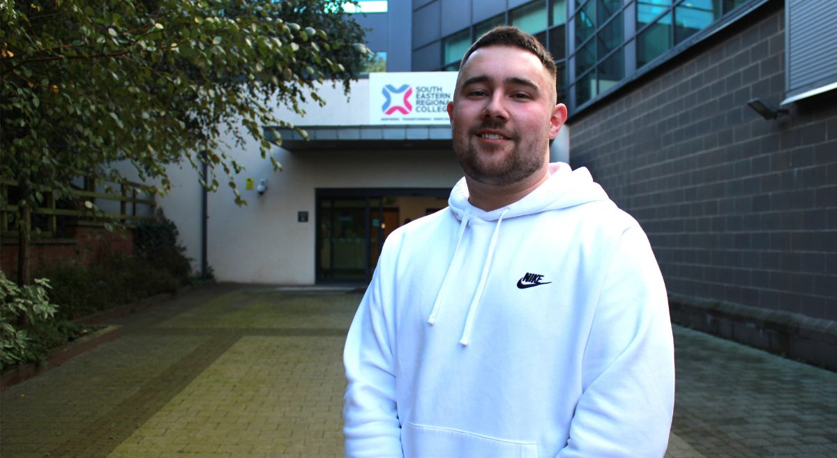 Matthew Blair wearing a white hoodie.